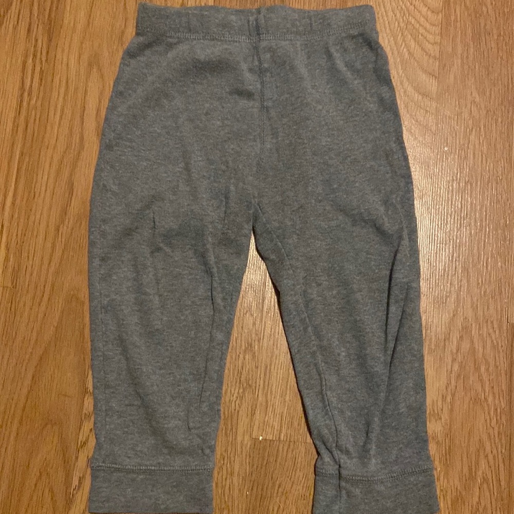 Gray joggers with wolf on the back